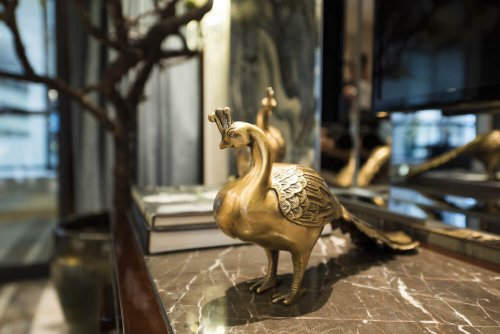 A sculpture of a peacock.