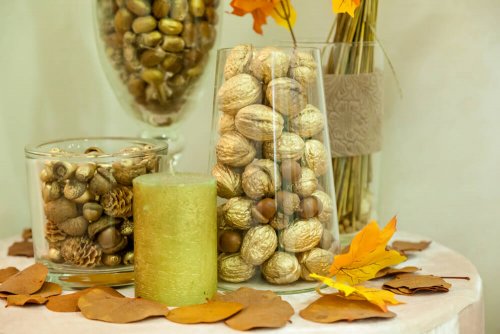 A set of decorated glass jars.
