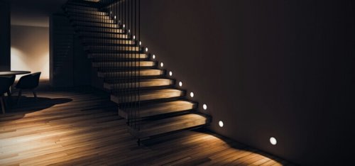 A staircase with LED lights.