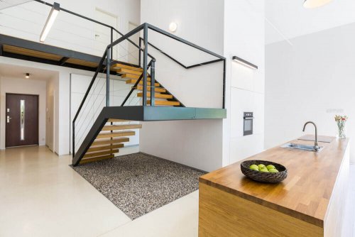 Square-shaped staircase in modern house.