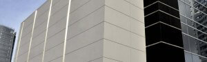Fiber cement siding on a large building.