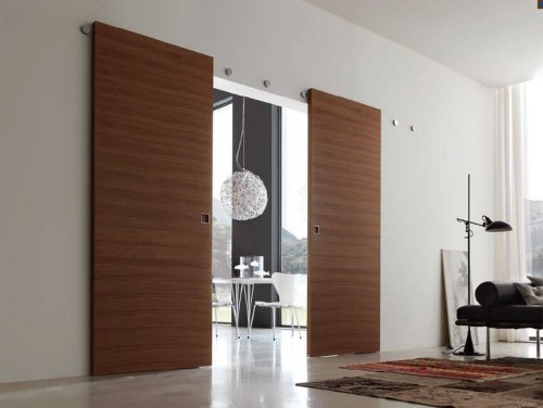 A modern room with wooden sliding doors.