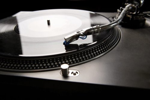 A turntable playing an LP.