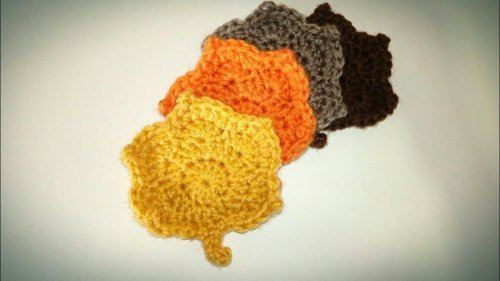Four crocheted coasters.