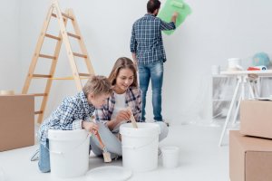 Painting the house as a family. 