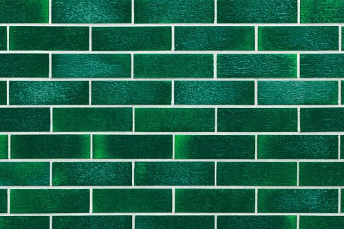A green tile wall.