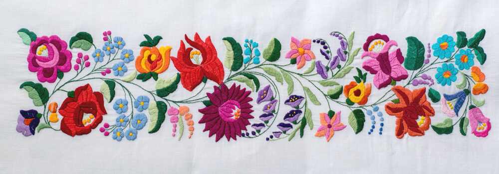 Embroidery showing a flowered motif