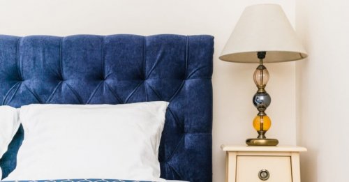 A blue velvet headboard.