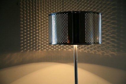 A washing machine drum turned into a floor lamp.