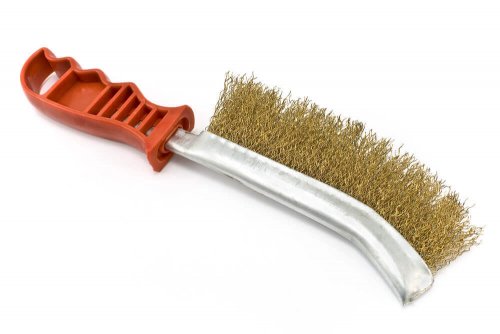 A metal wire brush can remove paint from metals.