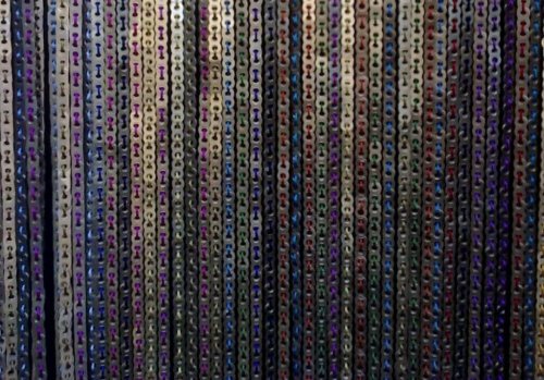 Colorful curtains made out of can tabs.