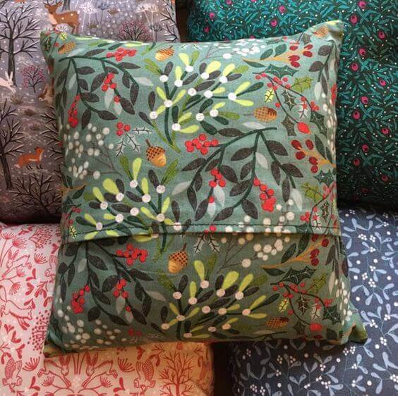 Fabric print cushion covers using leaves as a pattern.