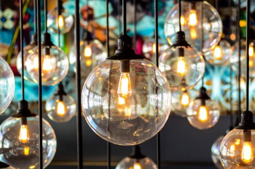 Round lamps hanging from the ceiling.