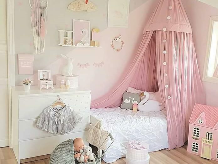 A pink canopy draws the eye in a child's bedroom