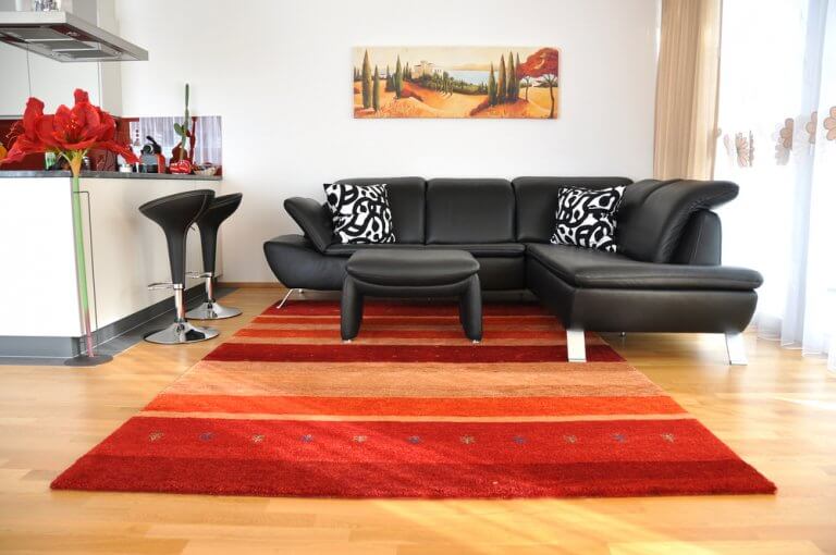 Use rugs to add extra warmth during the cold season