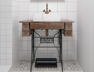 Repurposed sewing machine.