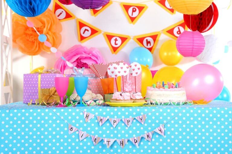 Decorating a colorful birthday party table