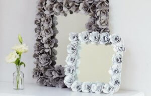 Mirror frames surrounded by flowers