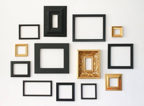 A few minimalist frames on a wall.
