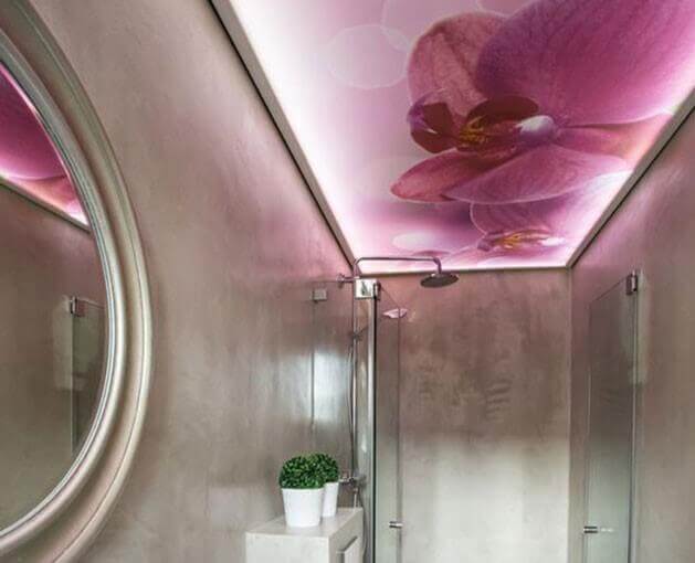 A pink tensile ceiling in a bathroom