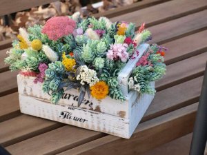 A bunch of flowers in a flower box