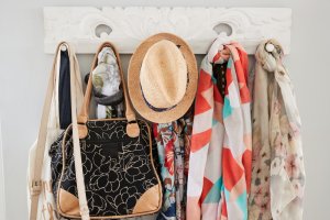 A coat rack can help you organize your articles of clothing.