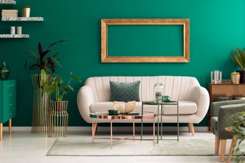 A living room with green and gold accents.