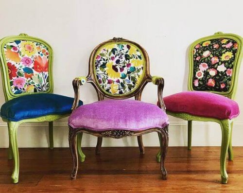 Three chairs with velvet seats and patterned backs