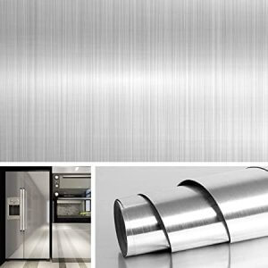 Decorating fridge door with vinyl that looks like stainless steel.