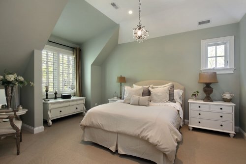 An elegant guest room full of basic accessories.