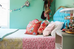 A bedroom with an eclectic design.