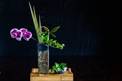 A nagerie style flower arrangement.