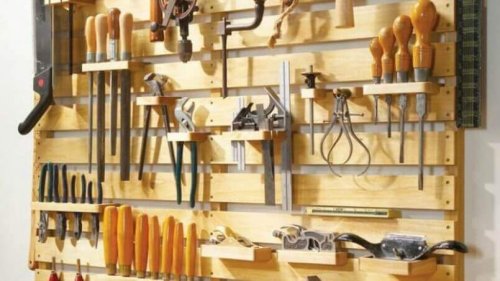 A pallet panel is a great option for organizing your household tools.
