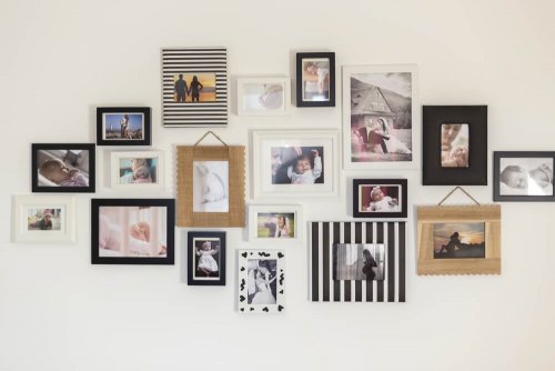 Photos hung on a wall.