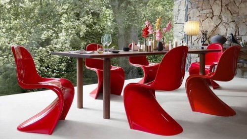 Pop style moded plastic chairs in red