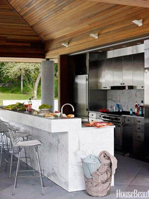 A porch with a full kitchen.