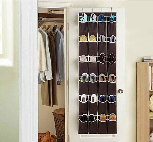 Placing a shoe rack behind a door can help you get more closet space.