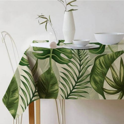 A festive tablecloth with larage green ferns