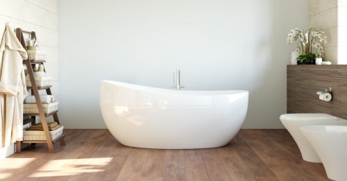 Dark wooden floors in a bathroom.