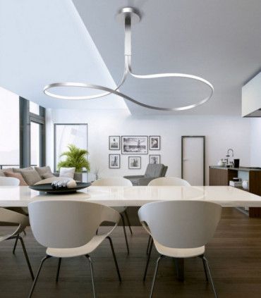 A curved lamp in the living room, one of the decor trends for spring.