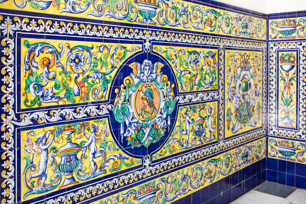 An intricate tiled design in the style of an Andalusian patio.