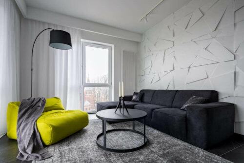 A white room with a shartruse easy chair to combine with the sofa