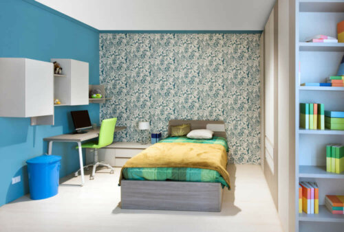 A youth bedroom in blue and green.