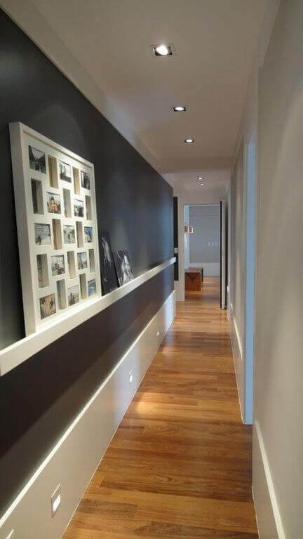 A well-lit dark gray hallway.