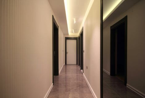 A small and dark hallway is an area that we need to illuminate