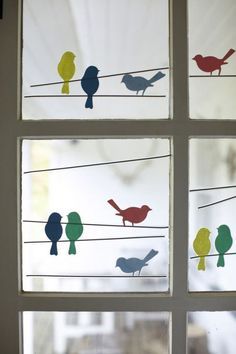 Paper craft birds to decorate the windows durint spring time