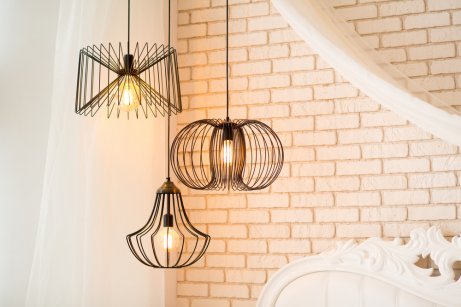 Low hanging decorative lights to illuminate dark areas with high ceilings