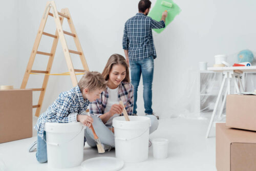 A family painting a room.