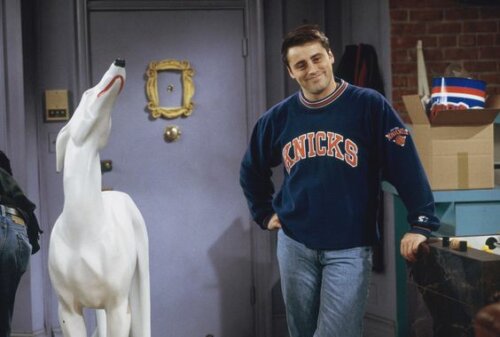 Joey and a ceramic, white dog