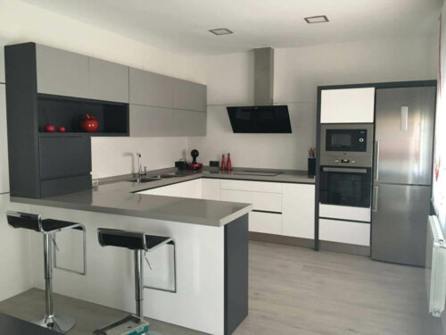 A silver kitchen organized by Feng Shui rules.